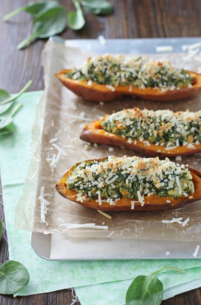 Spinach and Artichoke Sweet Potato Skins on a baking tray.