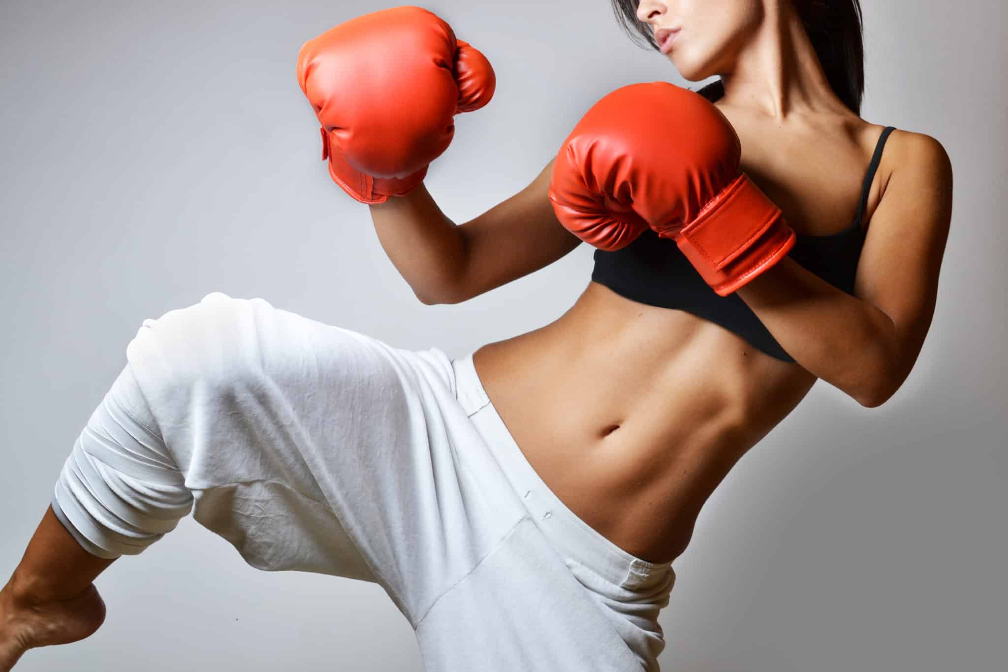 Woman kickboxing