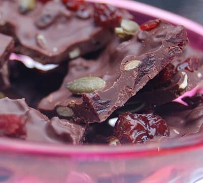Healthy dessert can't get much more simple than this pistachio and cranberry chocolate bark! Packed with antioxidants this sweet treat makes the perfect holiday gift and tastes amazing!