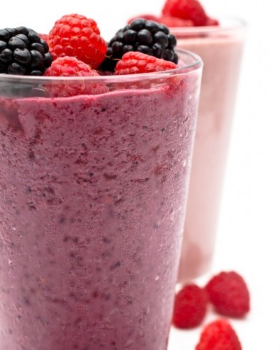 This delicious berry light breakfast smoothie is the perfect protein packed recipe full of antioxidants. Plus it taste like berry ice cream without all the fat and calories!