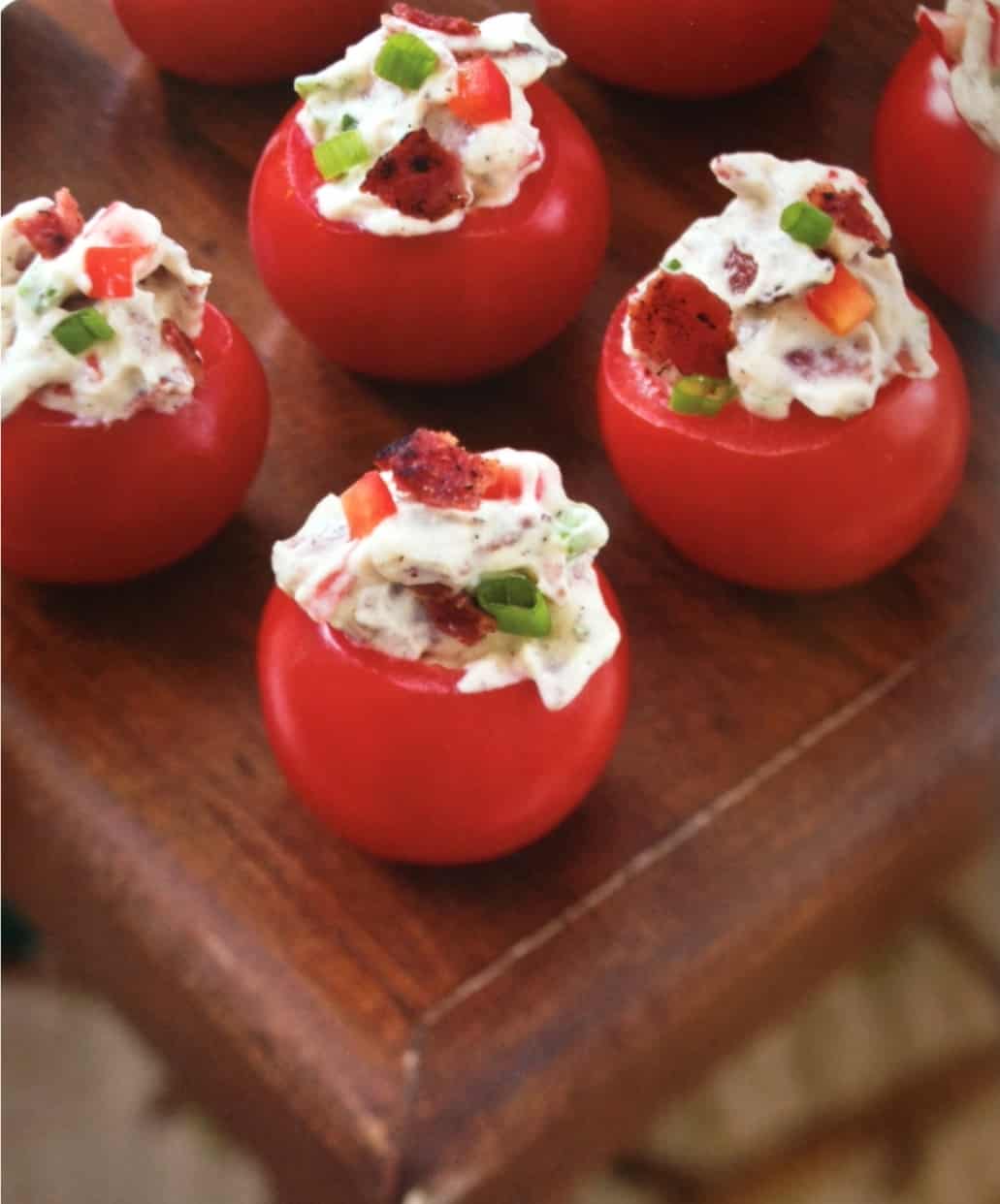 These bacon stuffed cherry tomatoes are a delicious and healthy snack that are simple to make. They are great for dinner parties or a fun, healthy appetizer!