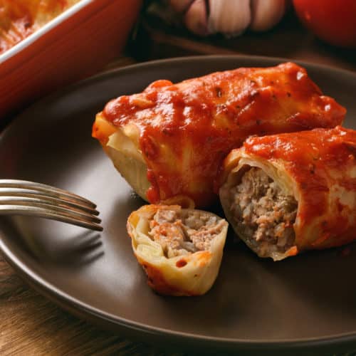 Cabbage Rolls on plate with red sauce