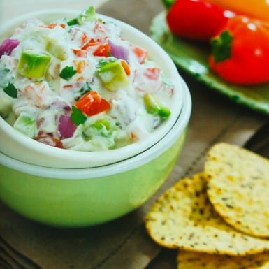 Dip into this creamy avocado dip at your next fiesta! This dip is packed with protein and has a delicious rich texture bursting with Mexican flavors!