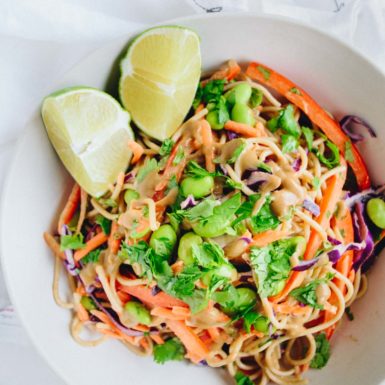 Filled with crunchy veggies, edamame and fresh cilantro, this asian noodle salad is packed with healthy goodness, major flavor and a peanut dressing.