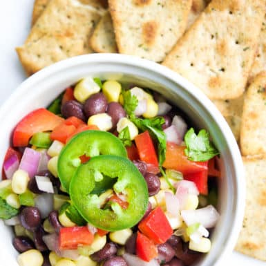 Make this healthy black bean and corn salsa recipe - perfect for chips or atop chicken!