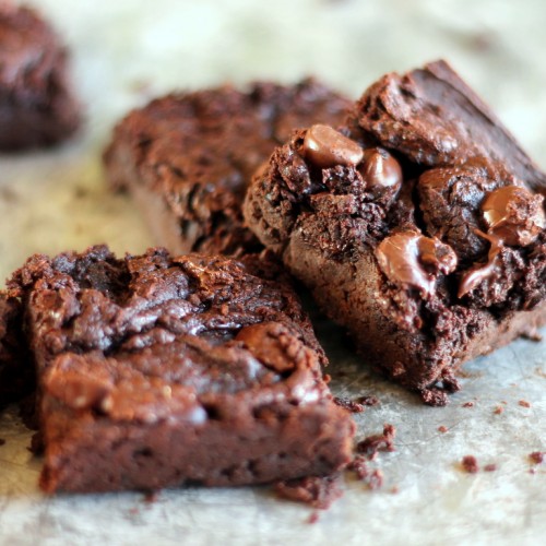 Thress Black Bean Avocado Brownies on parchment paper