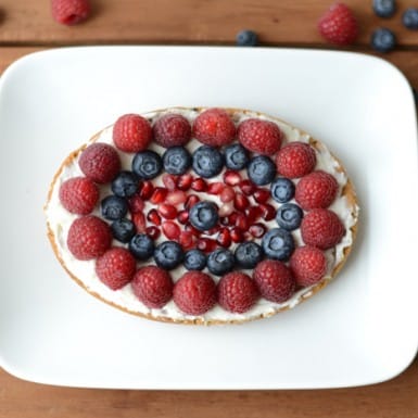 Gluten Free Chocolate Chip Cookie fruit Pizza topped with berries