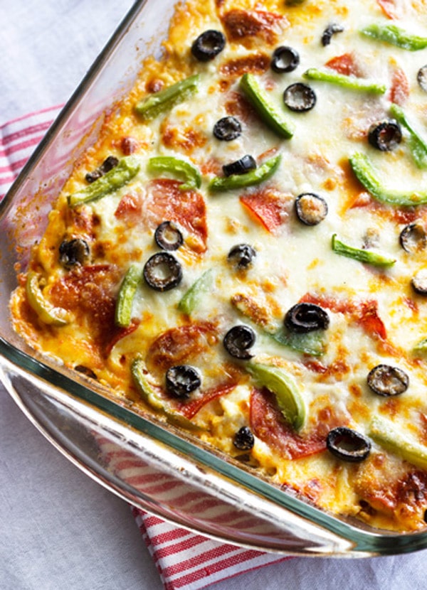 Pan of turkey zucchini pizza lasagna with black olives