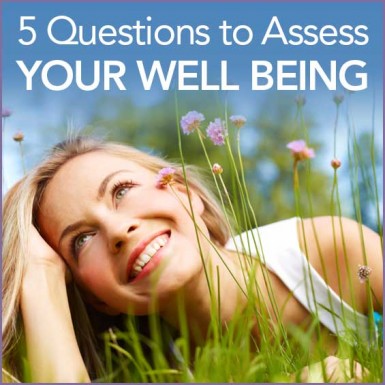 Woman laying in the grass with text "5 Questions to Assess Your Well Being"