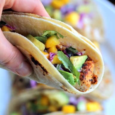 Fish tacos with avocado and purple cabbage