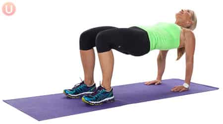 Chris Freytag demonstrating the best shoulder exercises: reverse table top plank