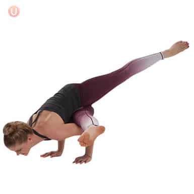 Chloe Freytag demonstrating side crow pose with straight legs