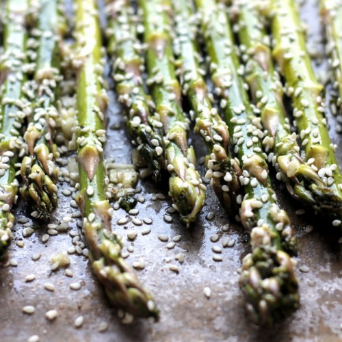 The Blogger NetworkAdvertise with us Report this ad Sesame Garlic Roasted Asparagus on a baking sheet.