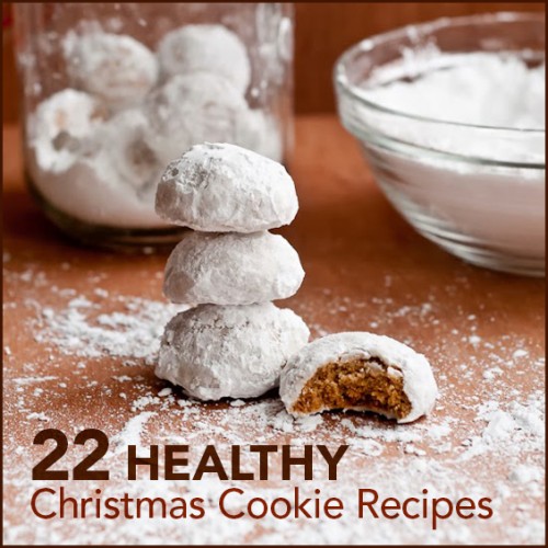 Spiced Chai Snowball cookies stacked on a table with the words "22 Healthy Christmas Cookie Recipes" below.
