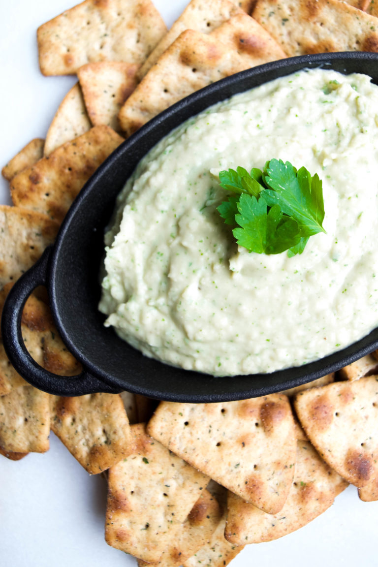 Dip into this creamy Italian white bean dip with fresh veggies or whole grain crackers for a simple snack that is super tasty and easy to make!