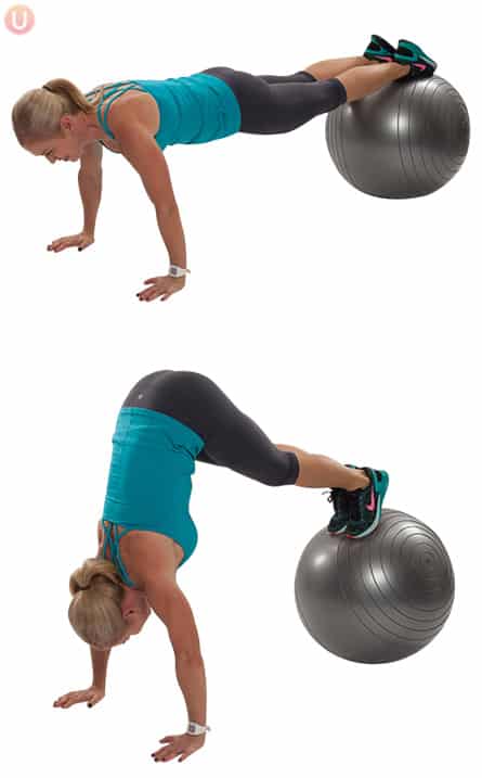 Chris Freytag demonstrating Stability Ball Ab Pike in a blue tank top on a silver stability ball