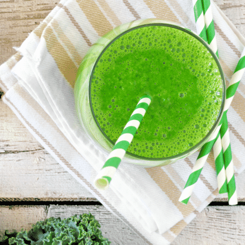 green smoothie with straw