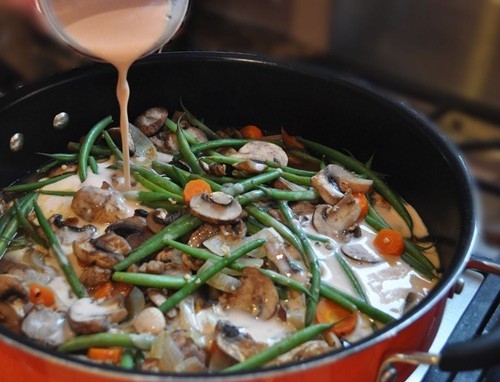 High Protein Mushroom Stroganoff in a pot on the stove.