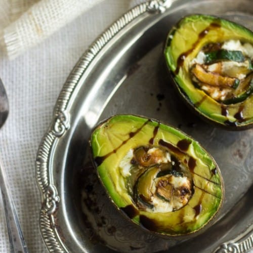 Baked Avocado Stuffed with Goat Cheese, Zucchini, and Balsamic Reduction