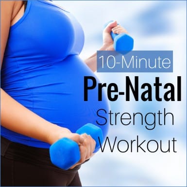 A pregnant lifting dumbbells and working out.