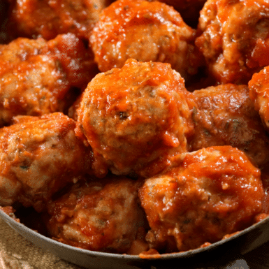 Italian turkey meatballs in a bowl in a red sauce
