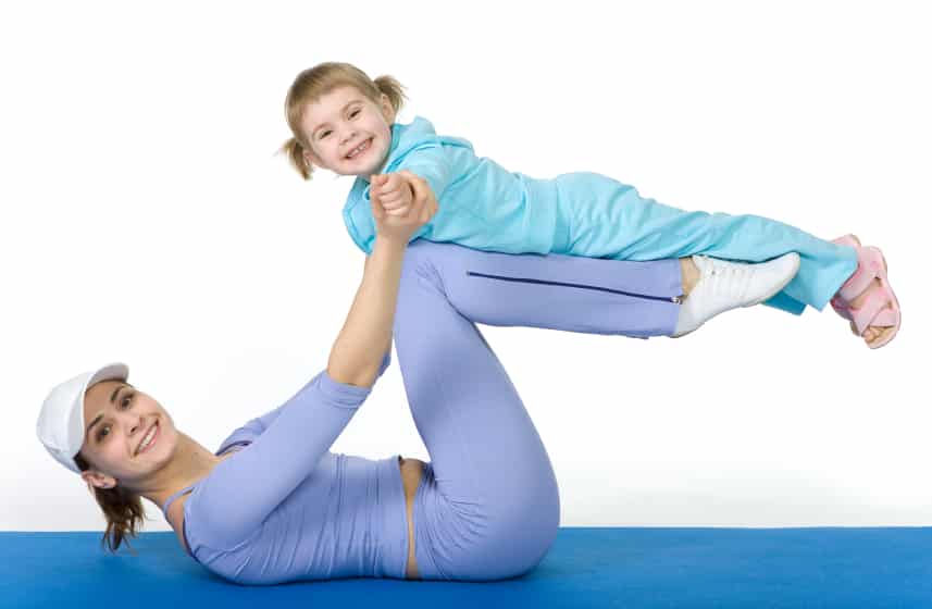 a woman playing with her daughter and burning calories too