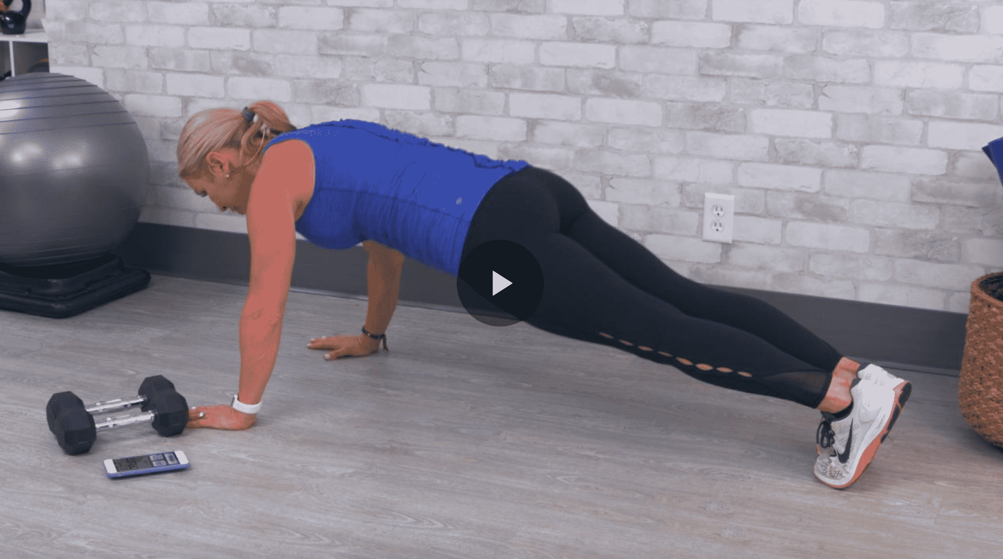 Chris Freytag doing a push-up in a 10-minute HIIT workout video