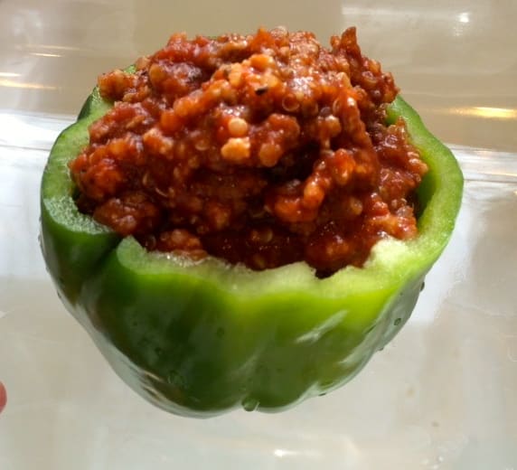 Peppers filled with quinoa, ground turkey, and Italian seasonings.
