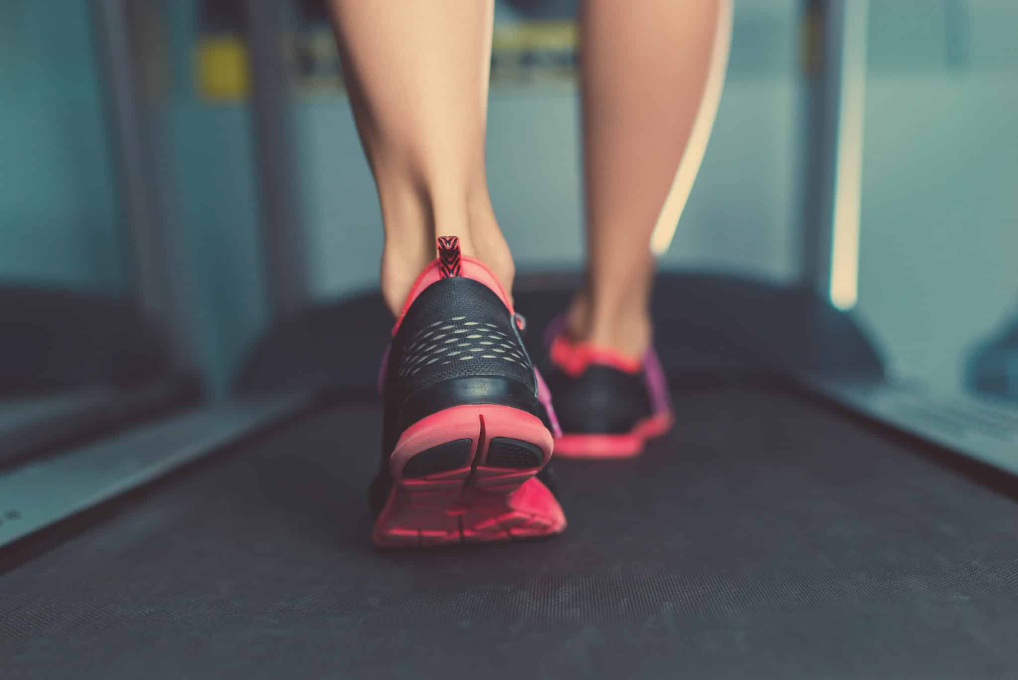 Close up of woman's feet on treadmill