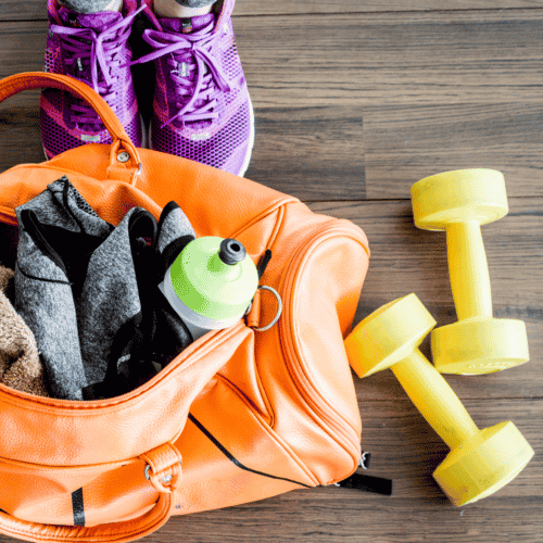 fitness bag and weights on the ground