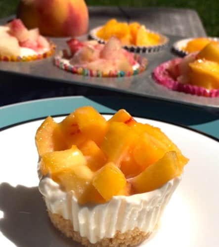 These easy frozen peach parfait cups take under 10 minutes to prep and taste like a frozen peach cobbler but are low-calorie and low-fat!
