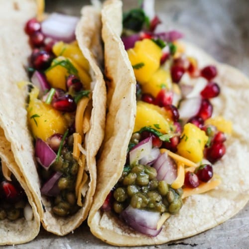 A vegan meal fit for king or queen these easy lentil tacos with mango pomegranate salsa are full of healthy flavors and nutrition!