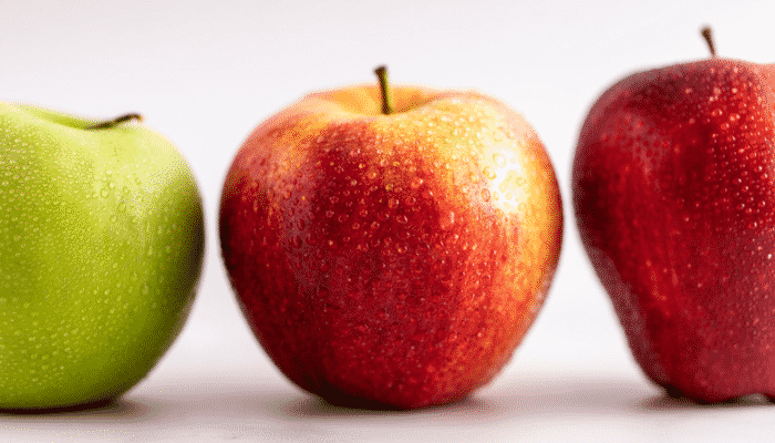3 different types of apples on white background
