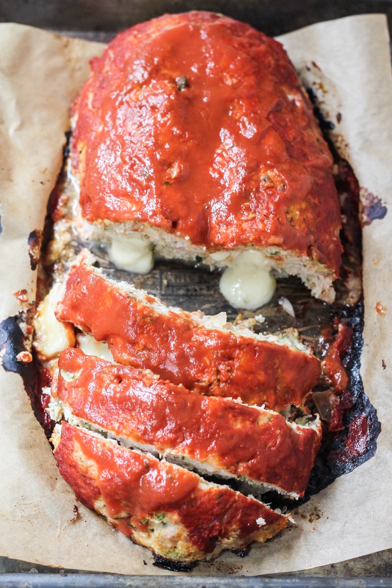Whip up this sassy zucchini turkey stuffed meatloaf stuffed with pepper jack cheese for a delicious and simple low-carb recipe.