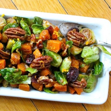 This orange glazed brussels sprout and butternut squash recipe is a must-make! Bring it to Thanksgiving for a fun twist on a classic side dish.