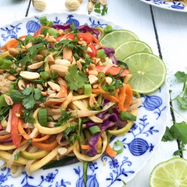 Ditch the take out food and try this healthy gluten-free pad Thai recipe filled with fresh veggies and topped with a delicious homemade peanut sauce.