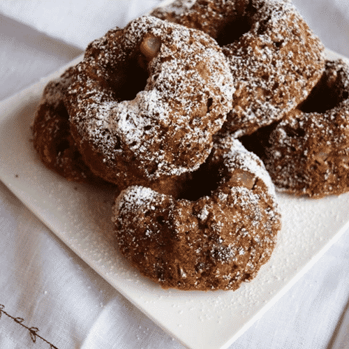 These mini bundt cakes made with whole wheat flour, coconut oil and applesauce are seriously a treat!