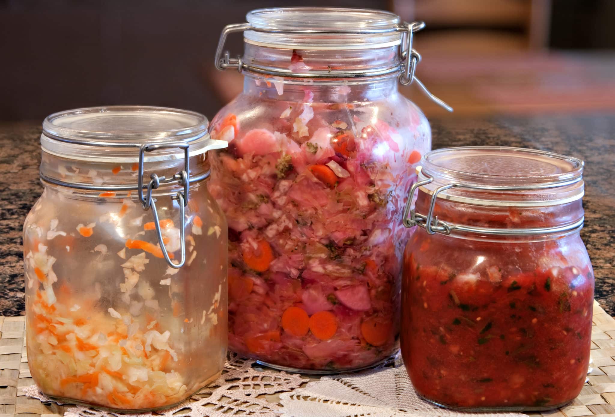 Homemade fermented vegetables in sealing glass jars