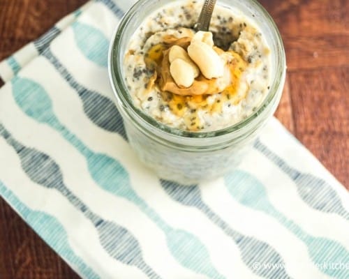 Jar or overnight oatmeal with chia seeds and peanut butter on towel