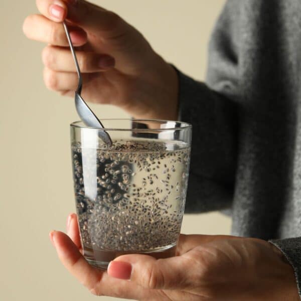 health benefits of chia seeds woman holding glass