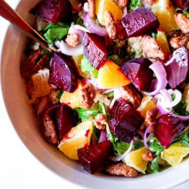 Beets, quinoa, arugula and so much more make this salad pack some major nutrition, flavor and color!