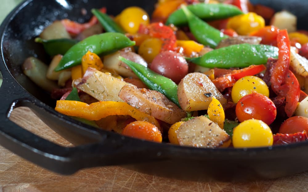 sauteed veggies in black pan