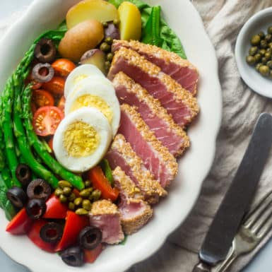 This whole 30 recipe for Asian Nicoise Salad with ginger vinaigrette is full of high quality protein and absolutely delicious!