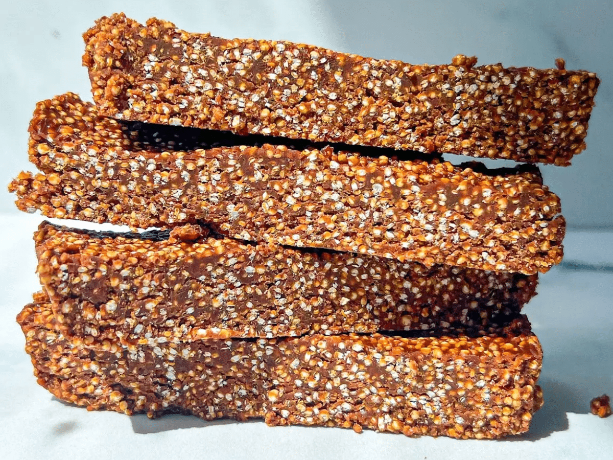 A stack of crunchy quinoa snack bars.