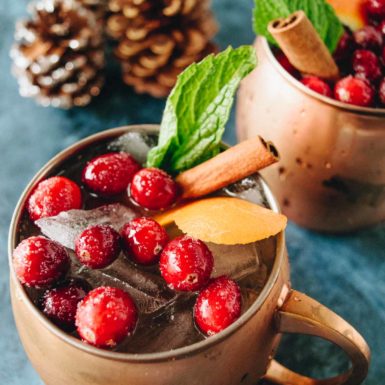 This Holiday Moscow Mule cocktail has fresh mint, ginger, and just a splash of cranberry for a festive and low-calorie healthier holiday cocktail.