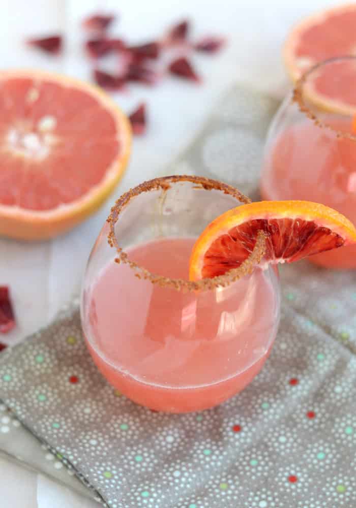 This blood orange & grapefruit mocktail is both delicious and nutritious! Plus, it's got the best pink color!