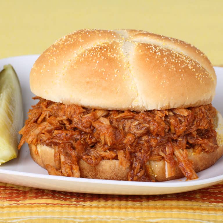 This slower cooker BBQ pork sandwich recipe is easy, healthy, and super tasty! Set it and forget it, come to an amazing BBQ dinner.