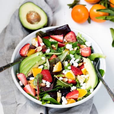 Whip up this delicious orange strawberry avocado salad with poppyseed dressing for a fresh summer salad filled with yummy ingredients!