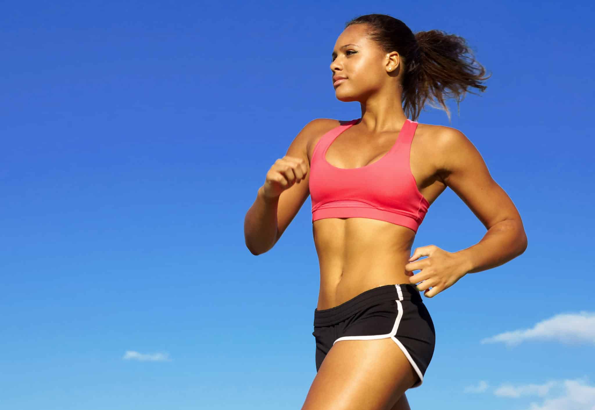Woman running in sports bra