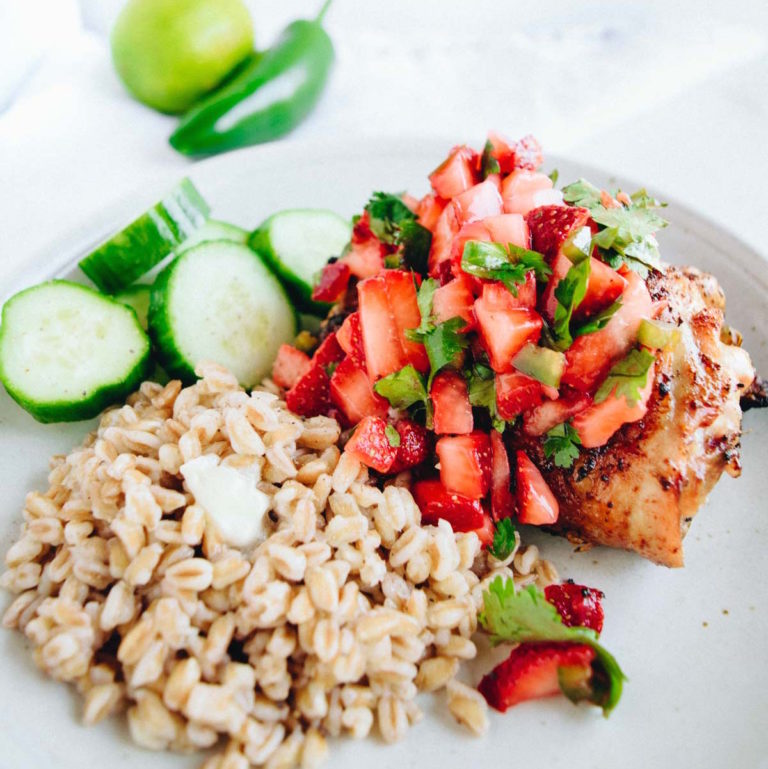 An easy grilled chili lime chicken recipe with a delicious, fresh cilantro strawberry salsa on top! It's so easy to throw together but tastes like you spent all day on it!